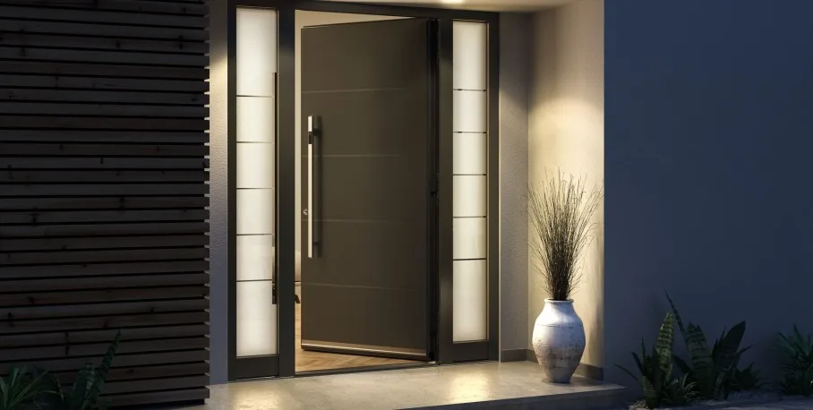 Spitfire aluminium entrance door, ajar at night