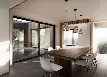 Aluminium sliding door with wide glazed panels, open to a garden