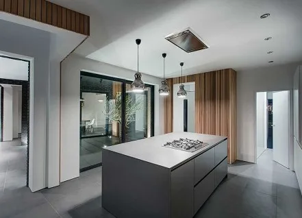 Aluminium sliding door with wide glazed panels in a kitchen