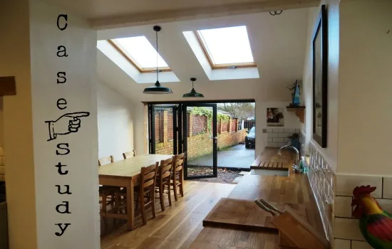 Kitchen diner extension with roof lights and bifold doors onto the garden