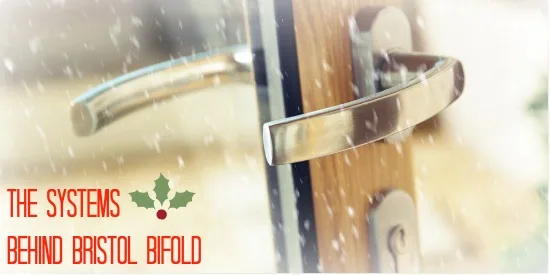 Close-up of stainless steel handles on a timber bifold door