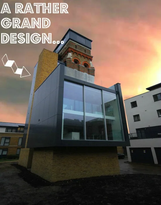 A modern glazed extension built onto a converted brick water tower
