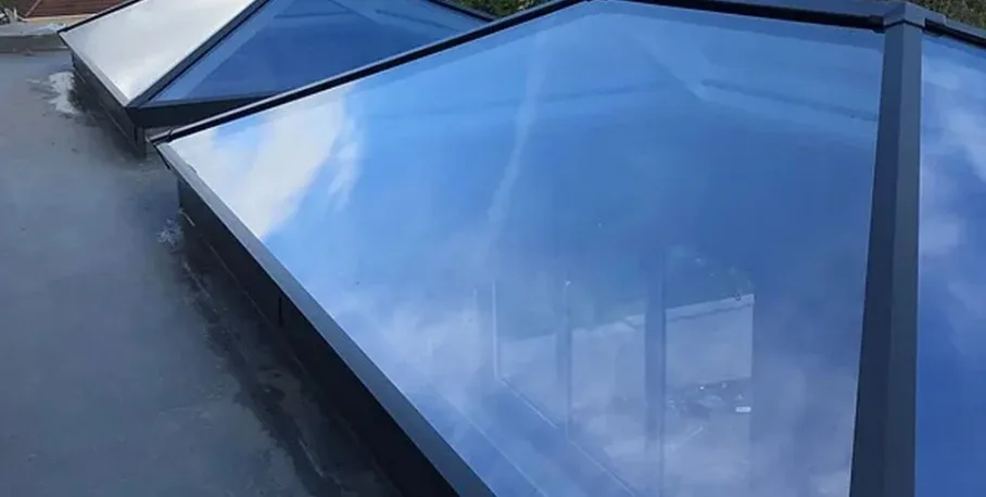 Two Titan S1 aluminium roof lanterns over a kitchen